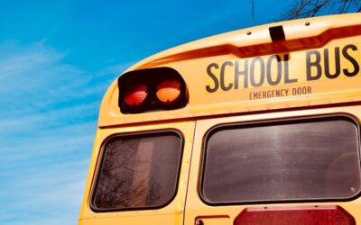 Elderly woman critically injured after being hit by school bus in Oshawa