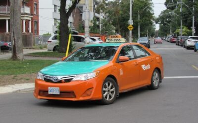 Taxi flips over in two-vehicle collision in downtown Toronto