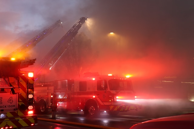 One firefighter injured after large fire breaks out at car dealership in Dutton